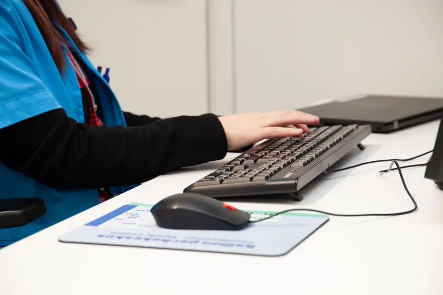 A person using a computer.