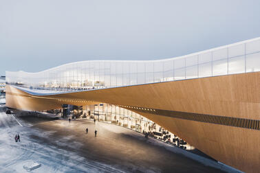 Outdoor photo of the Oodi Central Library building on a winter day.