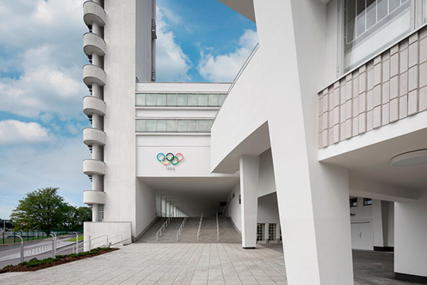 Pääsisäänkäynti Olympiastadionin A-katsomoon. Kuva: Stadion-säätiö / Wellu Hämäläinen. Pääsisäänkäynti Olympiastadionin A-katsomoon. Kuva: Stadion-säätiö / Wellu Hämäläinen.
