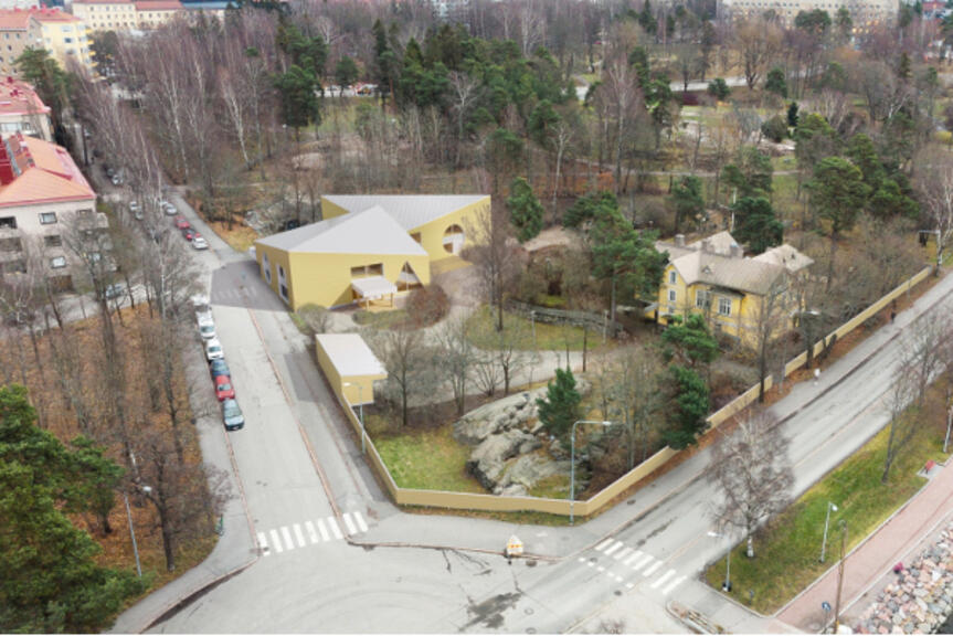 Ilmakuva, vehreä tontti jonka vasemmassa laidassa havainnekuva uudesta keltaisesta kaksikerroksisesta päiväkodista. Ilmakuva, vehreä tontti jonka vasemmassa laidassa havainnekuva uudesta keltaisesta kaksikerroksisesta päiväkodista.