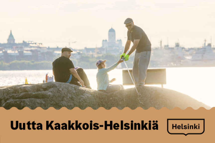 Perhe viettää aikaa kallioilla ilta-auringossa, taustalla Tuomiokirkko Laajasalosta katsottuna. Perhe viettää aikaa kallioilla ilta-auringossa, taustalla Tuomiokirkko Laajasalosta katsottuna.