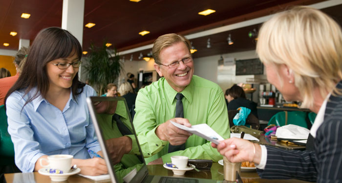 Business meeting in a cafe, picture: Comma Image Oy